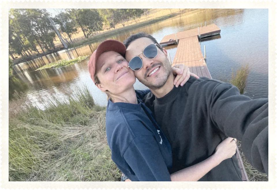 Katie and Carlos by a lake